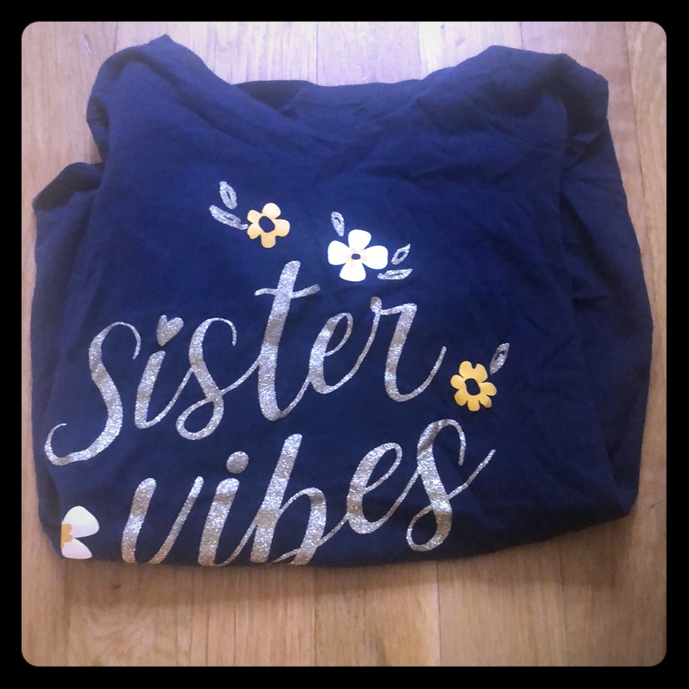 A sister vibes shirt